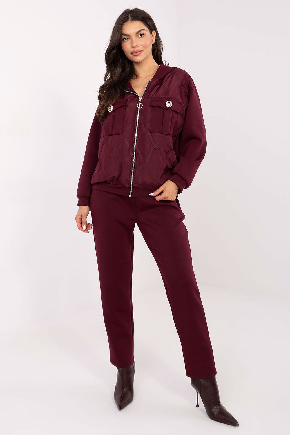 Italy Moda high waist pants from the women's tracksuit set, designed for comfort and style with an elastic waistband and side slip pockets.