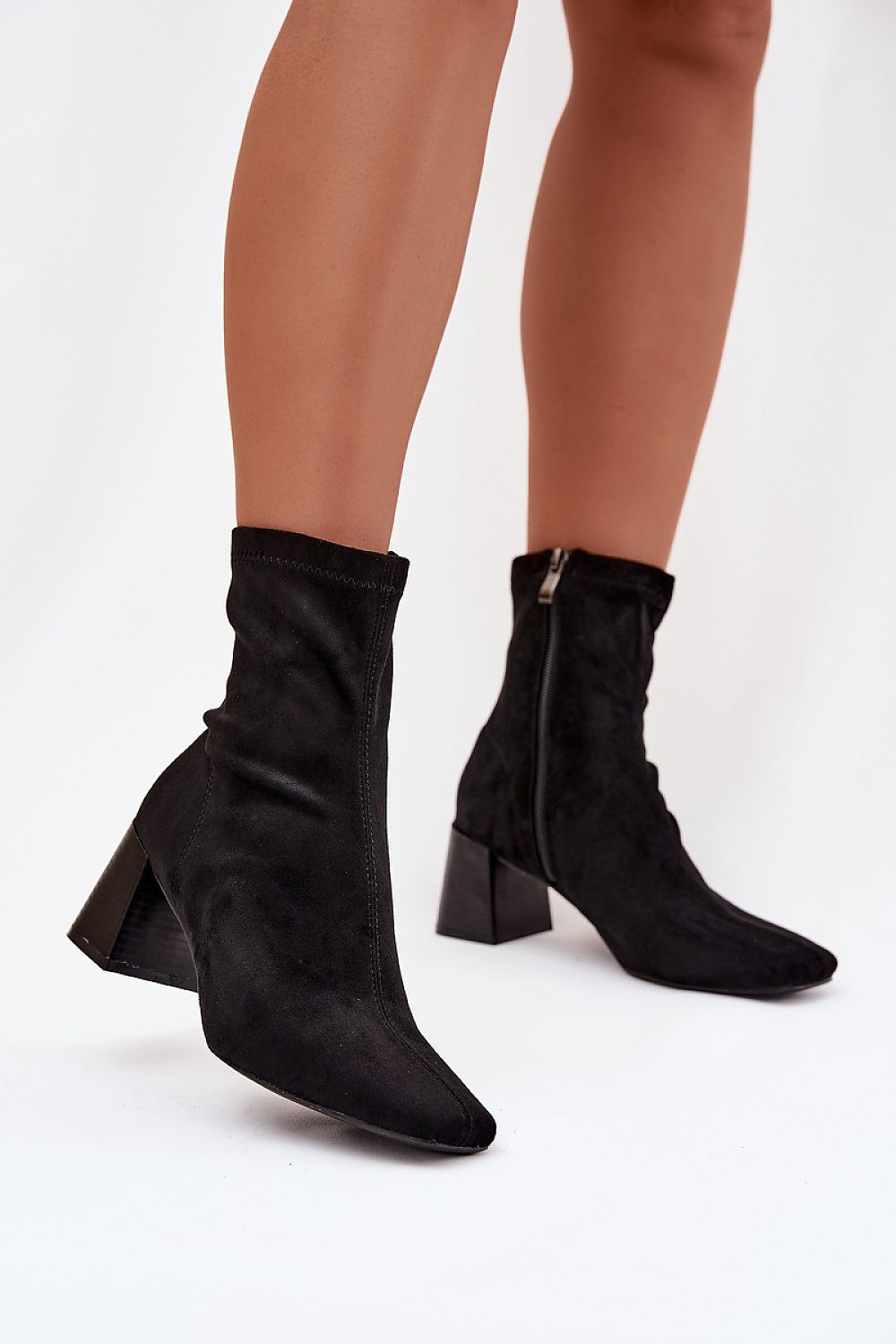 Elegant Women's Eco-Suede Ankle Boots by Step in Style featuring a luxurious 7cm heel and side zipper for easy wear.