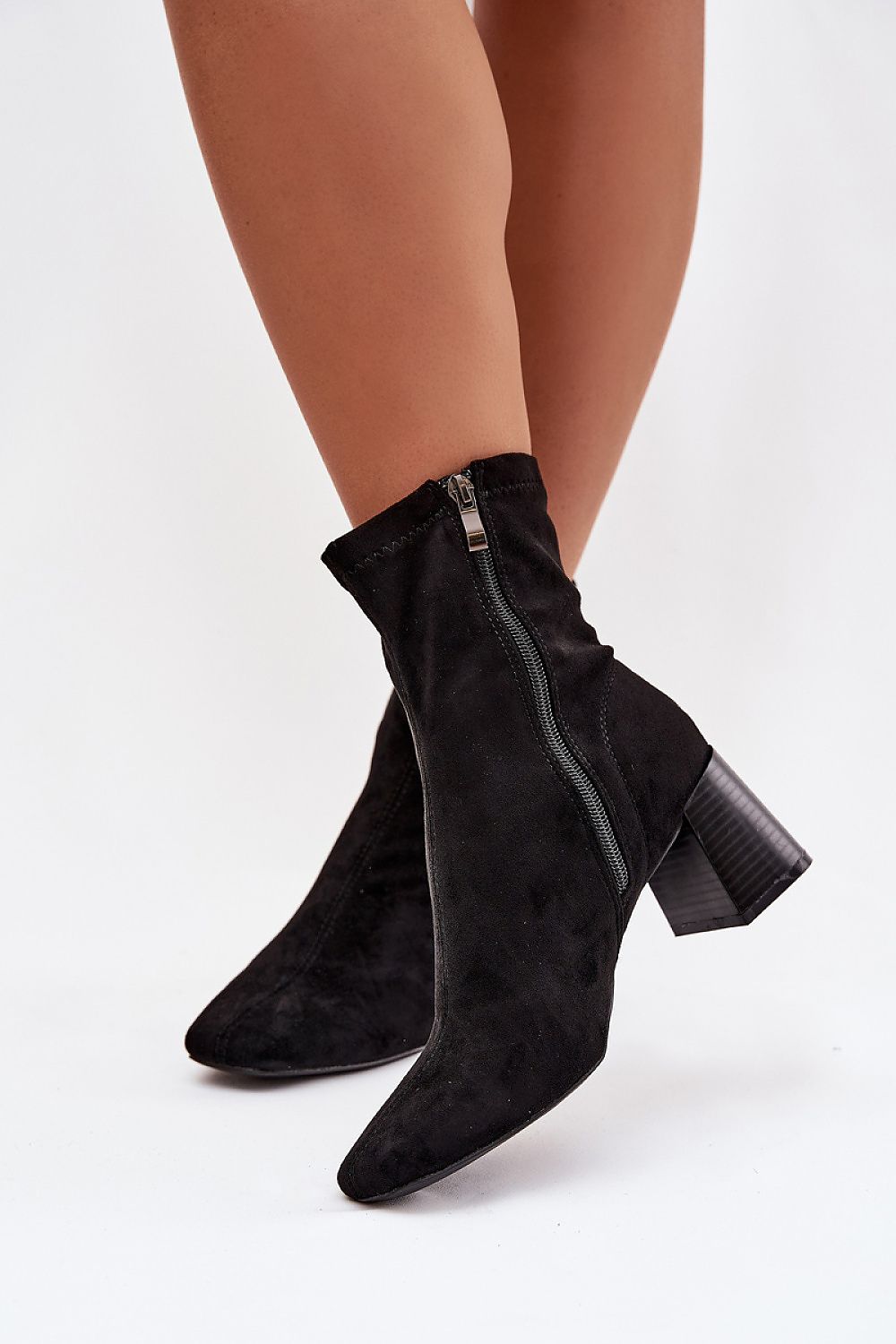 Elegantly styled Elegant Women's Eco-Suede Ankle Boots by Step in Style, designed to flatter legs and enhance autumn and winter outfits.