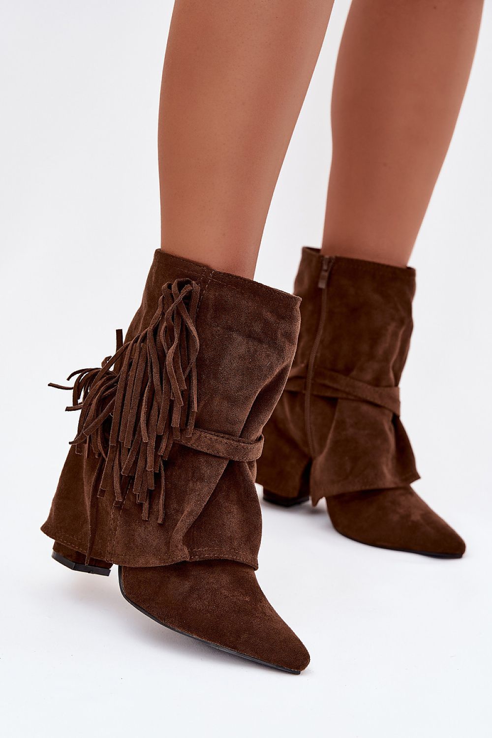 Close-up view of Women's Eco Suede Ankle Boots featuring luxurious gold buckles and stylish fringes, designed by Step in Style for a sophisticated wardrobe.