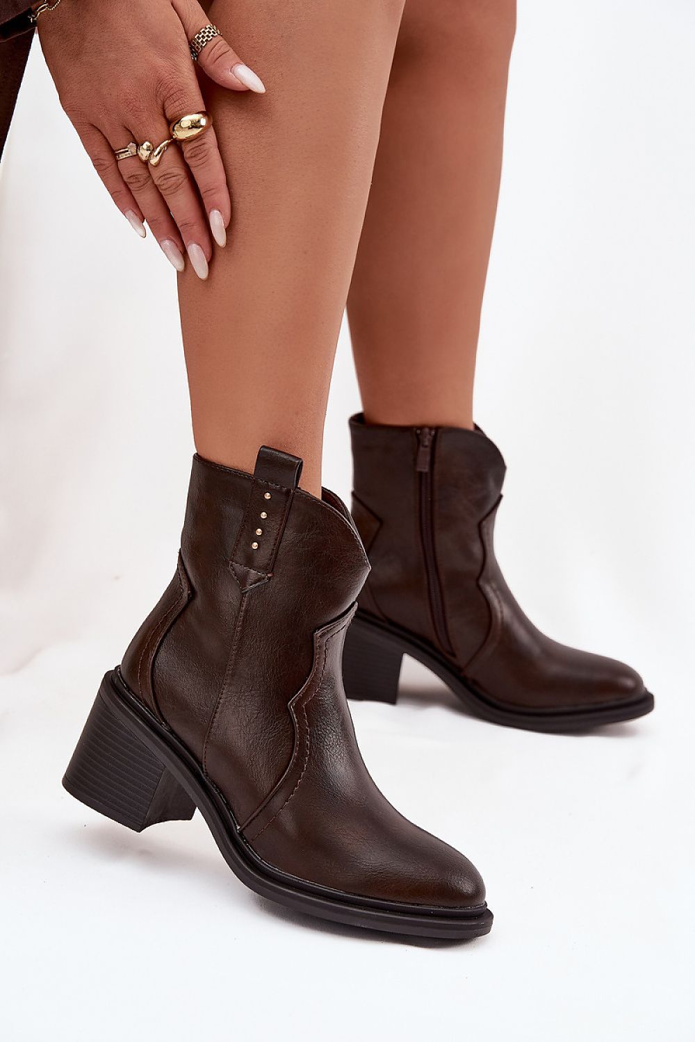 Stylish close-up of the Women's Eco Leather Cowboy-Style Ankle Boots by Step in Style, showcasing the rounded toe and luxurious eco leather finish.