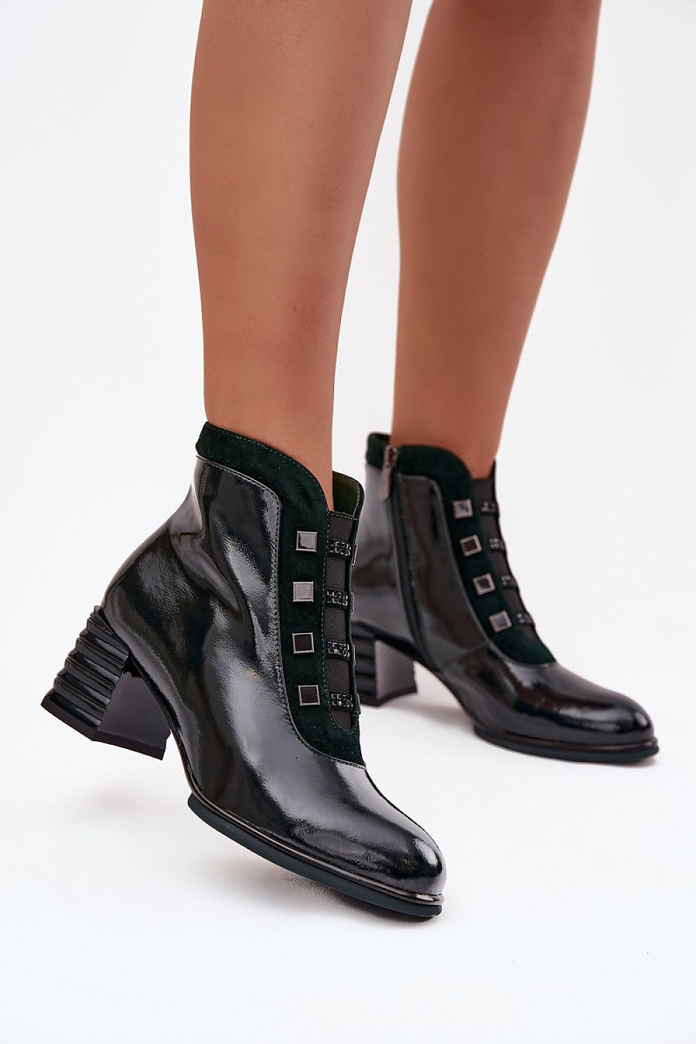 Elegant Women's Patent Leather Ankle Boots by Step in Style featuring a glossy finish and sophisticated silhouette, perfect for chic autumn-winter wear.