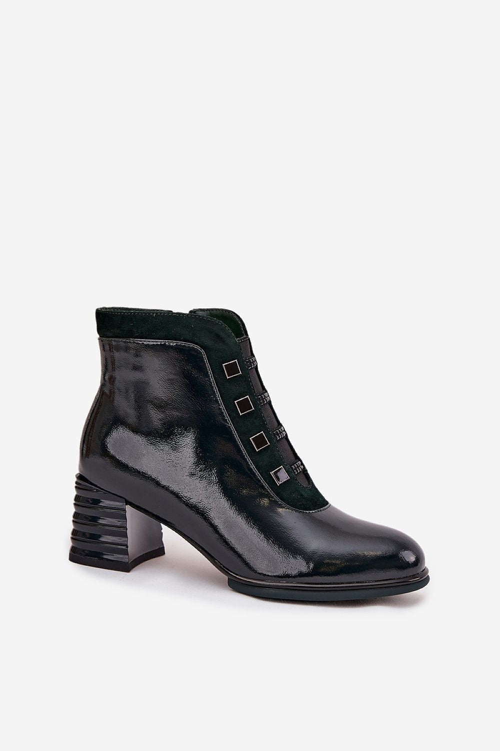 Close-up of Step in Style Women's Patent Leather Ankle Boots showcasing the stylish zipper closure and rounded toe design, ideal for fashionable comfort.