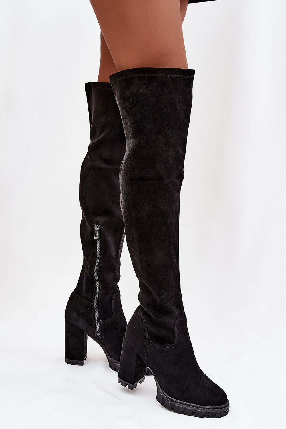 Elegant knee-high women's heel boots in black artificial leather by Step in Style, featuring a 10.5 cm column heel.