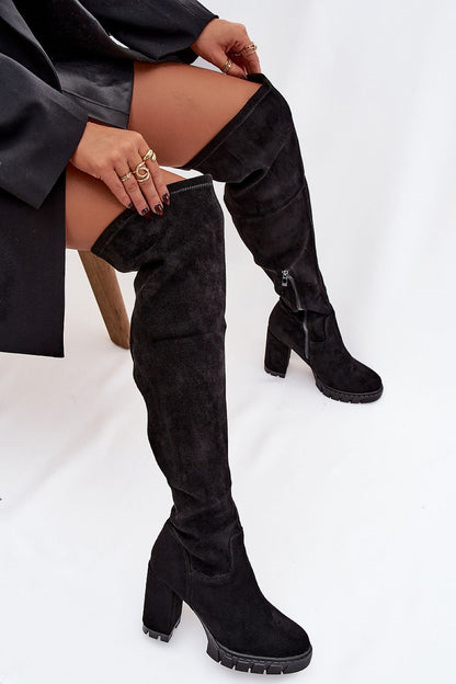 Stylish knee-high women's heel boots in various outfits by Step in Style, designed for versatile elegance and comfort.