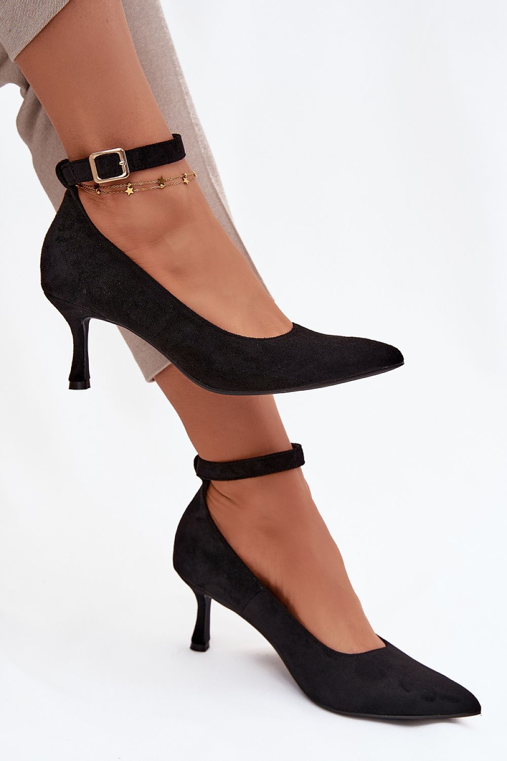 Elegant 7cm high heel pumps in eco suede with adjustable ankle strap by Step in Style, showcasing a chic pointed toe design suitable for ladies in sizes EU 36-41.