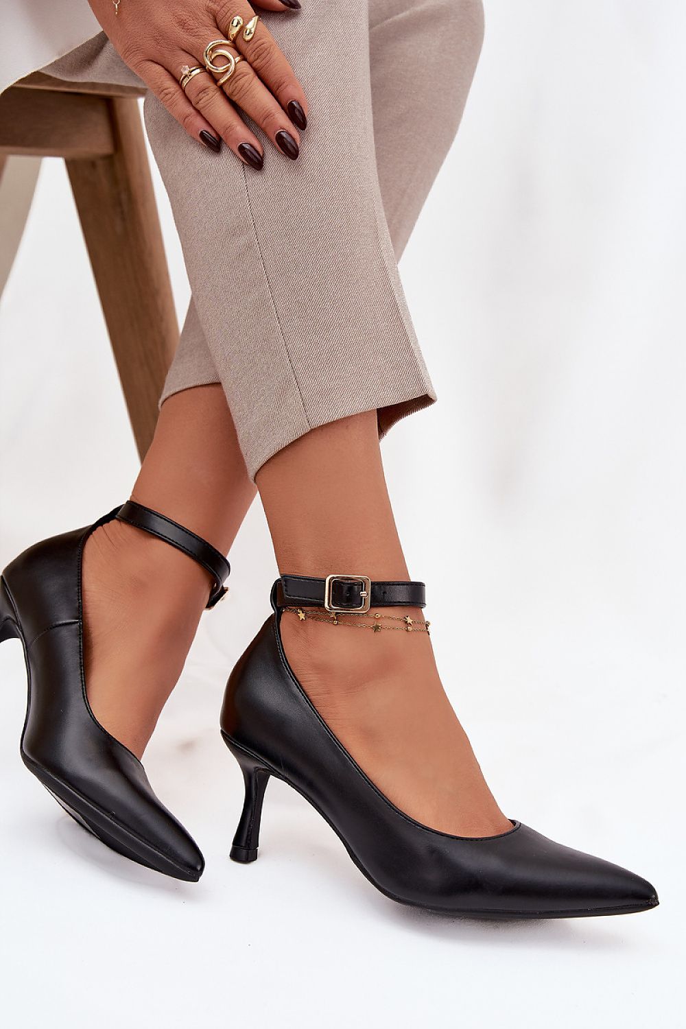 Close-up of luxurious eco leather material of high heel pumps designed for women by Step in Style, highlighting the stylish buckle and the 7 cm slim heel for a graceful silhouette.