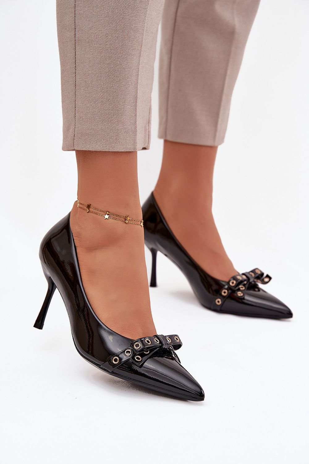 Elegant Patent Eco Leather High Heels with Bow by Step in style, showcasing a glossy finish and pointed toe design ideal for sophisticated occasions.
