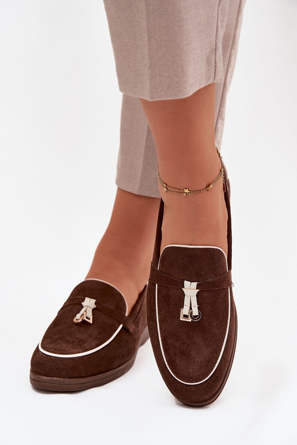 Step in Style's luxurious Eco Suede Loafers displayed in various sizes (EU 36-41), emphasising elegance and comfort for fashion-conscious individuals.