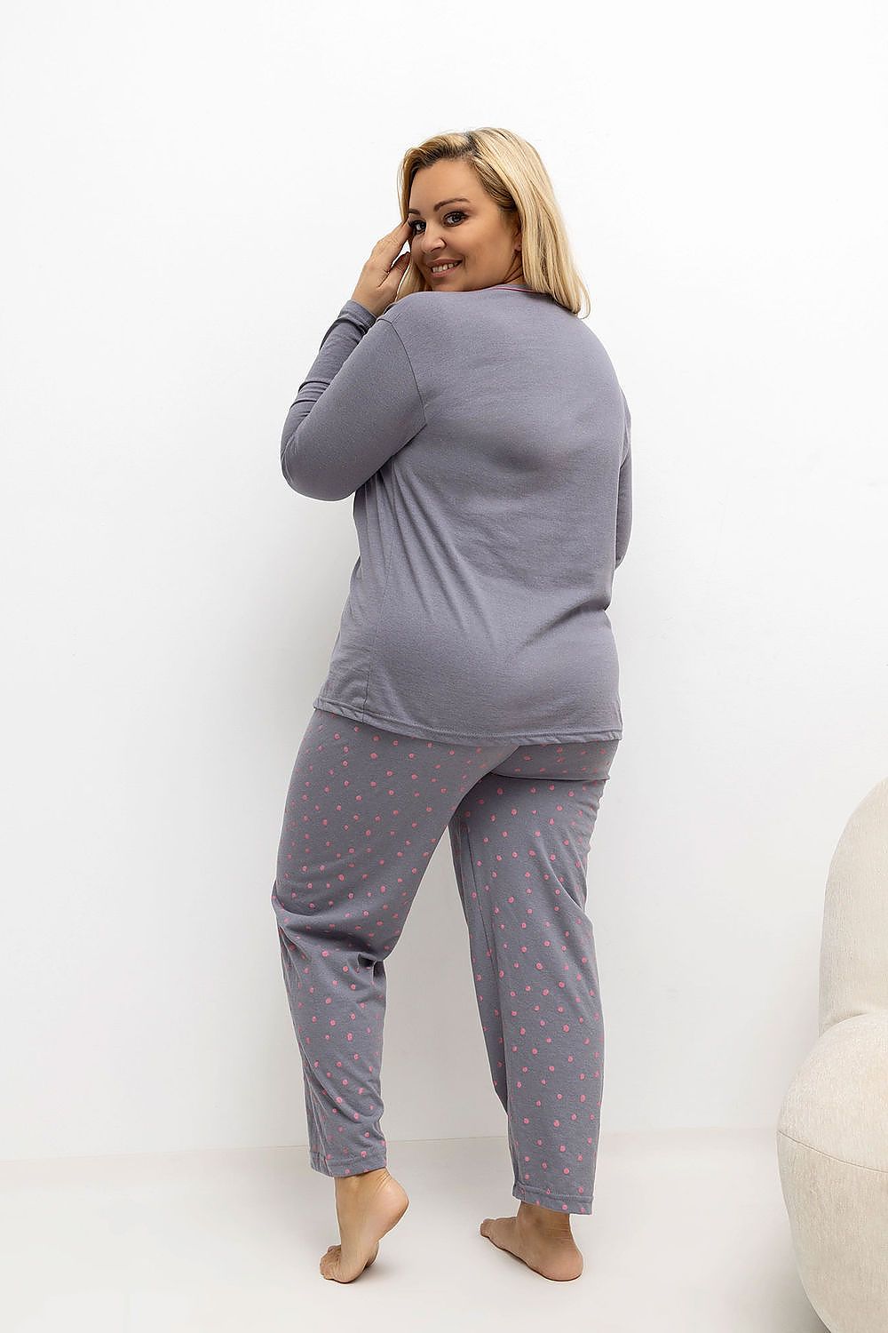 Luxury Plus Size Pajamas Set by Forever Pink featuring an elegant buttoned top and polka dot pants, perfect for curvaceous women seeking comfort and style