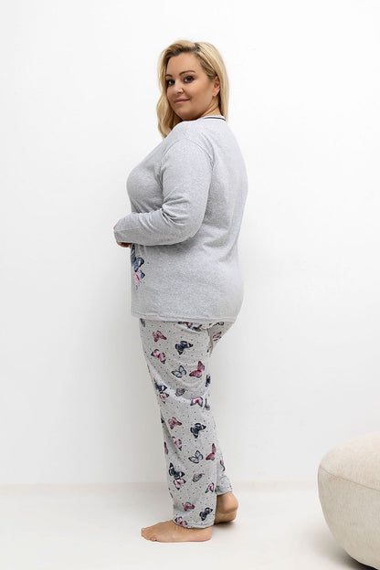 Close-up of the butterfly print detail on the luxurious Plus Size Pajamas Set by Forever Pink, highlighting the elegant design crafted for curvy women.