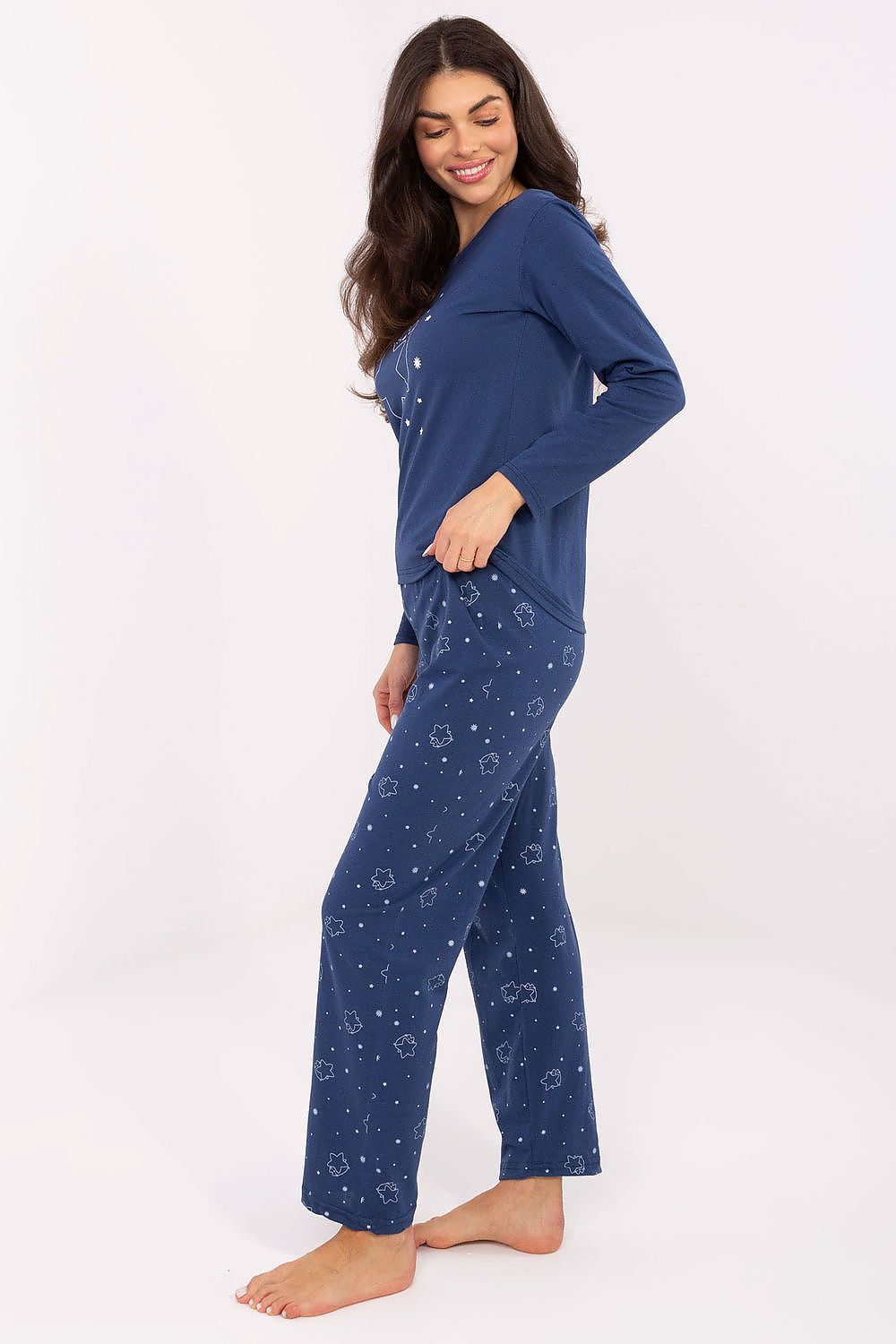 Close-up view of the intricate star print on Forever Pink's luxury cotton pajama set, exemplifying elegance.