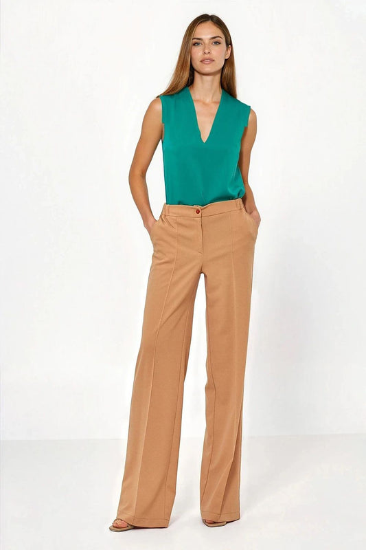 Elegant display of Nife's Luxury Caramel Loose Cut Trousers, highlighting the rich caramel colour and tailored fit, perfect for casual or formal occasions.