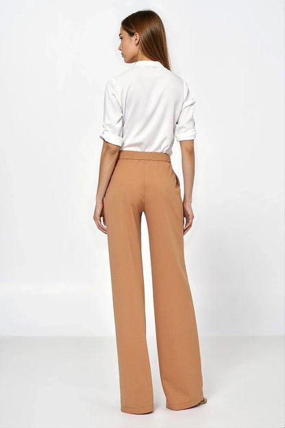 Nife's Luxury Caramel Loose Cut Trousers for Women in high waist style, shown paired with a chic top, emphasizing versatility and elegance in fashion.