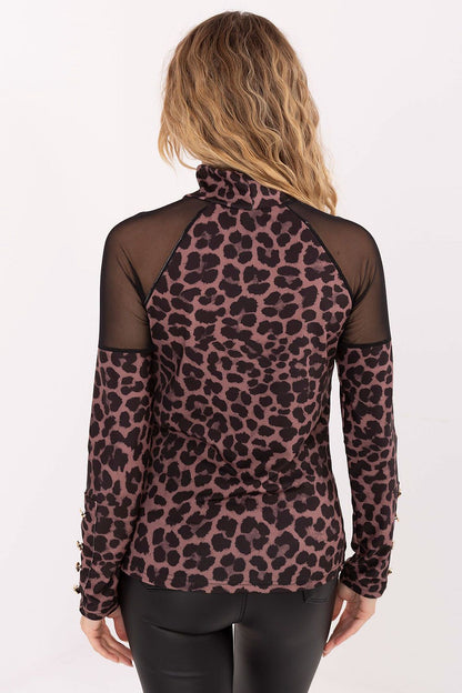 Elegant Rue Paris Blouse styled for a glamorous evening out, highlighting its graceful silhouette and modern charm.