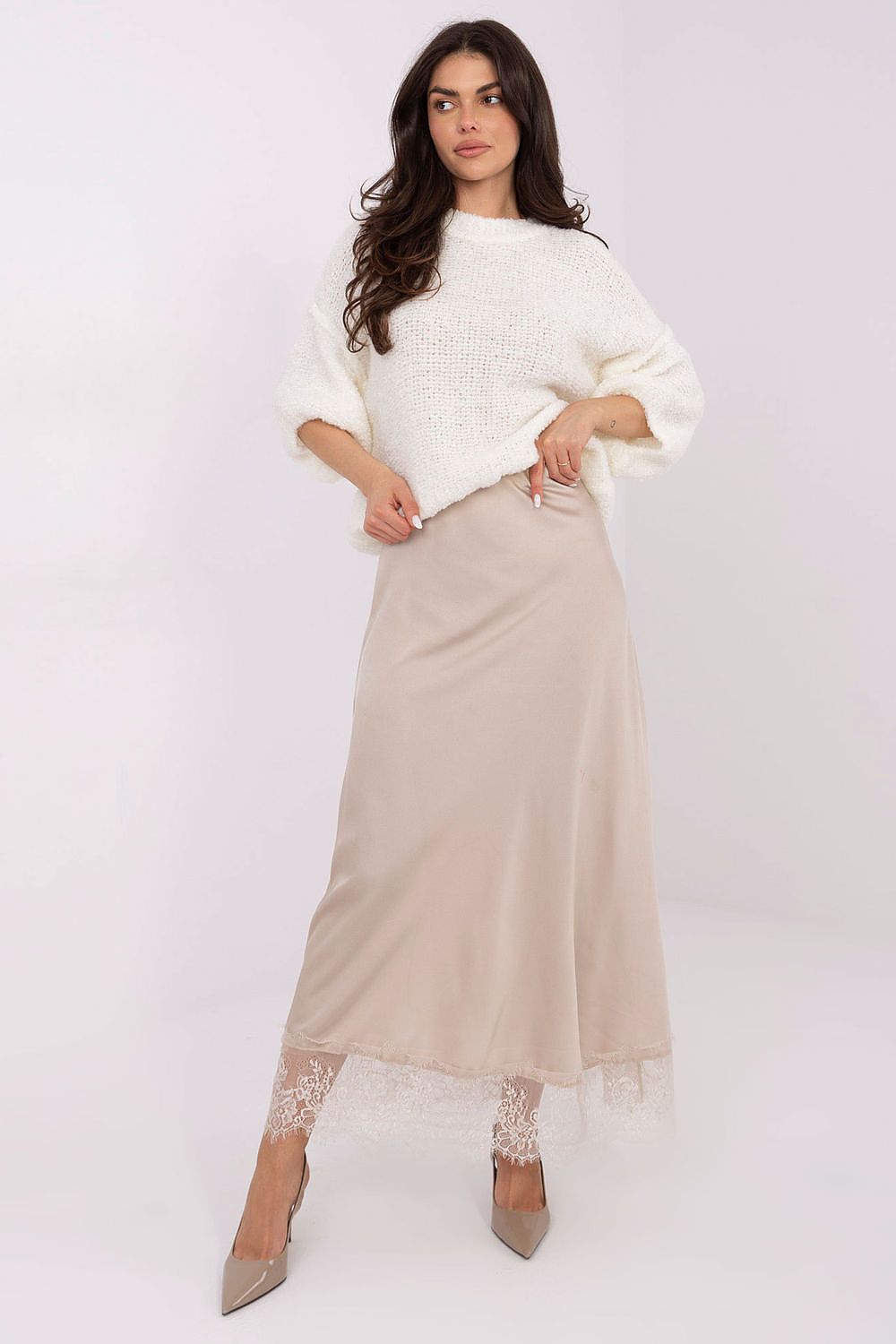 Chic model wearing the Elegant Satin Maxi Skirt with Lace Detail by Rue Paris, demonstrating its versatile style for both casual and formal occasions.