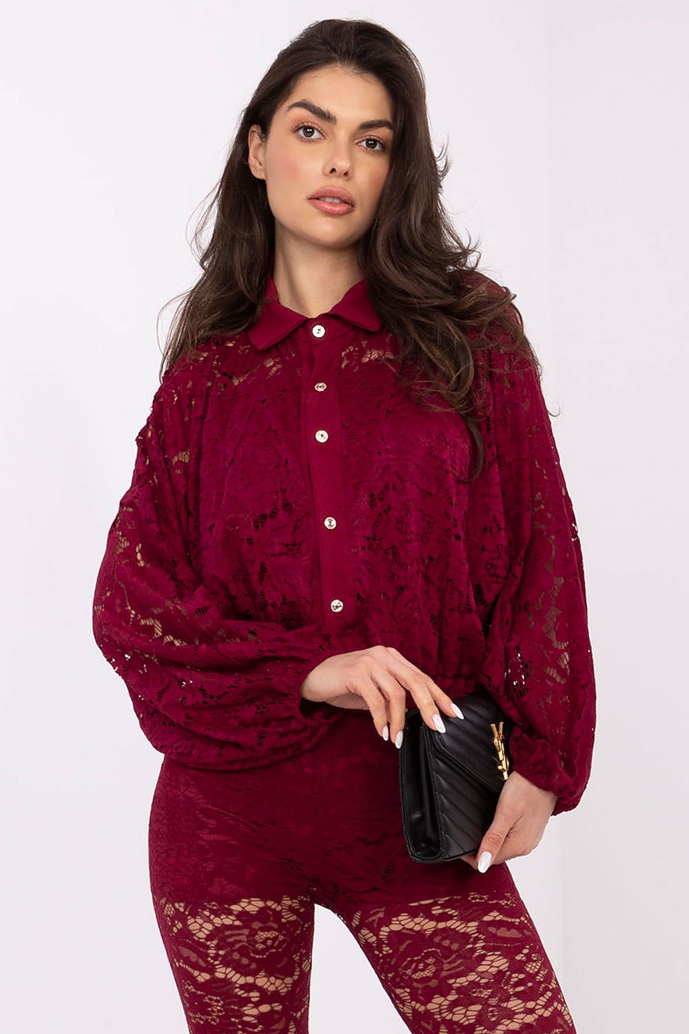 Stylish Italy Moda women's lace shirt with puffy sleeves and a flattering elasticated bottom in elegant design.