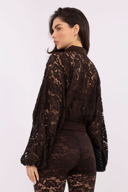 Detailed view of the button-up front and elasticated bottom of the Elegant Women's Long Sleeve Lace Shirt by Italy Moda, emphasising comfort and elegance.