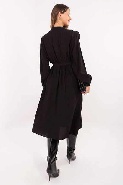 Model wearing the Elegant Midi Shirt Dress by Italy Moda, demonstrating its versatility from casual to formal settings with elegant styling.