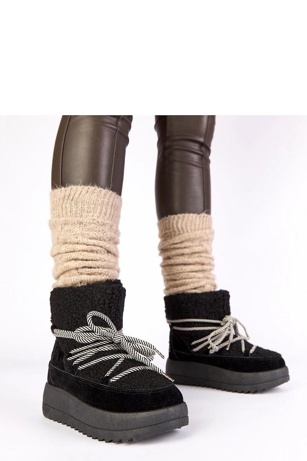 Solea Women's Black Lace-Up Snow Boots featuring luxurious fur lining, perfect for stylish winter adventures.