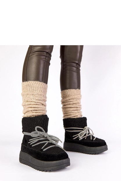 Solea Women's Black Lace-Up Snow Boots featuring luxurious fur lining, showcasing elegant winter fashion for outdoor adventures, available in EU sizes 36-41.