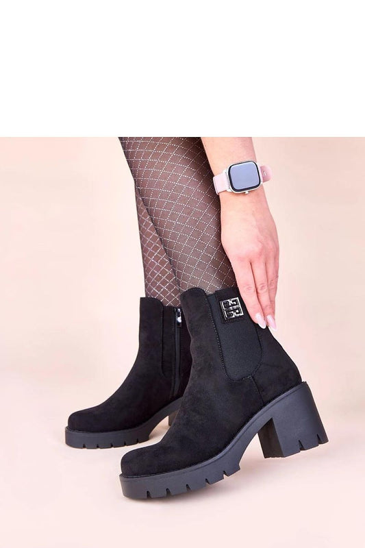 Sophisticated black ankle boots with an elastic insert by Gemre, showcasing a chic design suited for both casual and formal occasions.