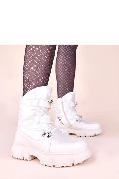 Close-up of the sturdy sole of Jassi Women's Pearl Glow Snow Boots, designed for excellent traction in winter conditions, crafted by Solea.