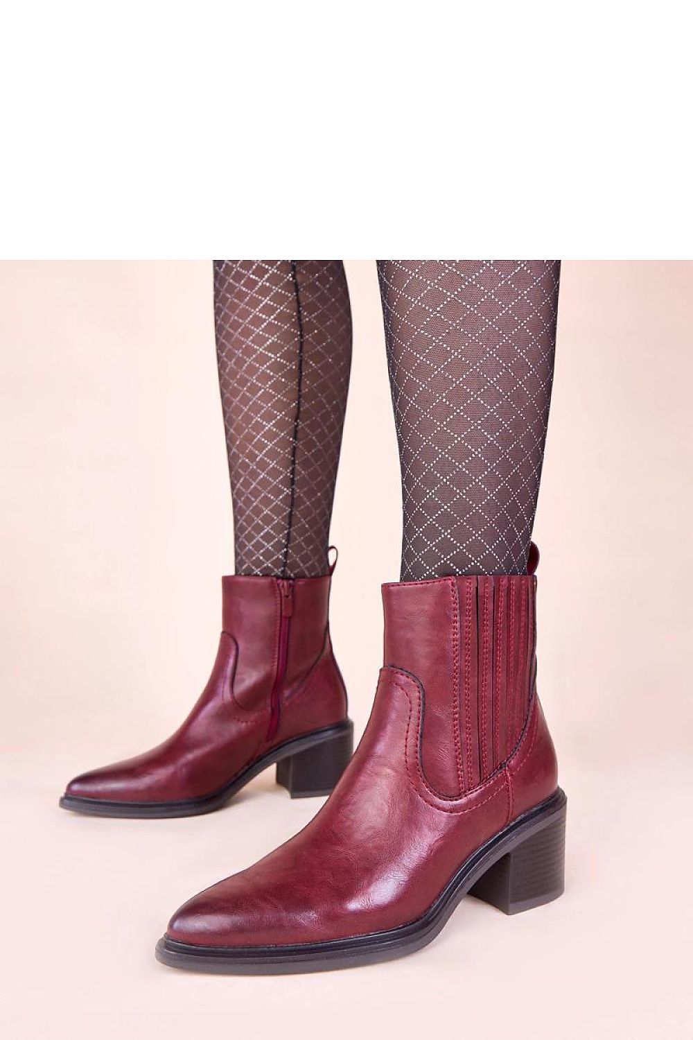 Elegant burgundy ankle boots with a chic 7cm slim heel and elastic insert by Solea, showcasing a sophisticated design for luxury footwear lovers.