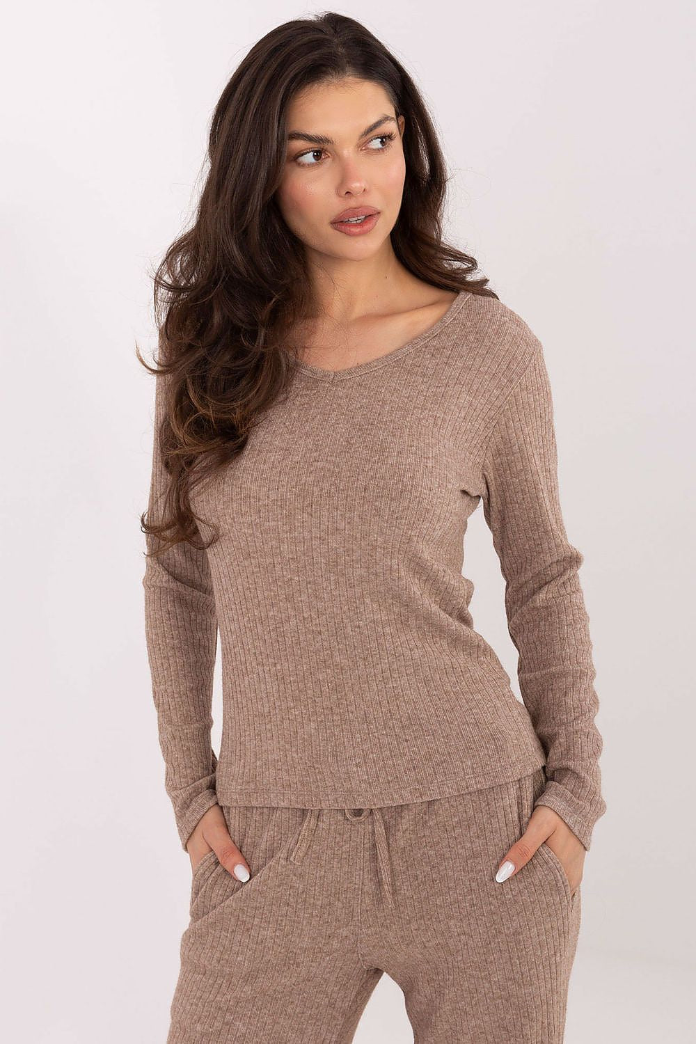 Model wearing Factory Price Elegant Women's Casual V-Neck Sweater in EU 0, styled elegantly for a casual yet chic look.