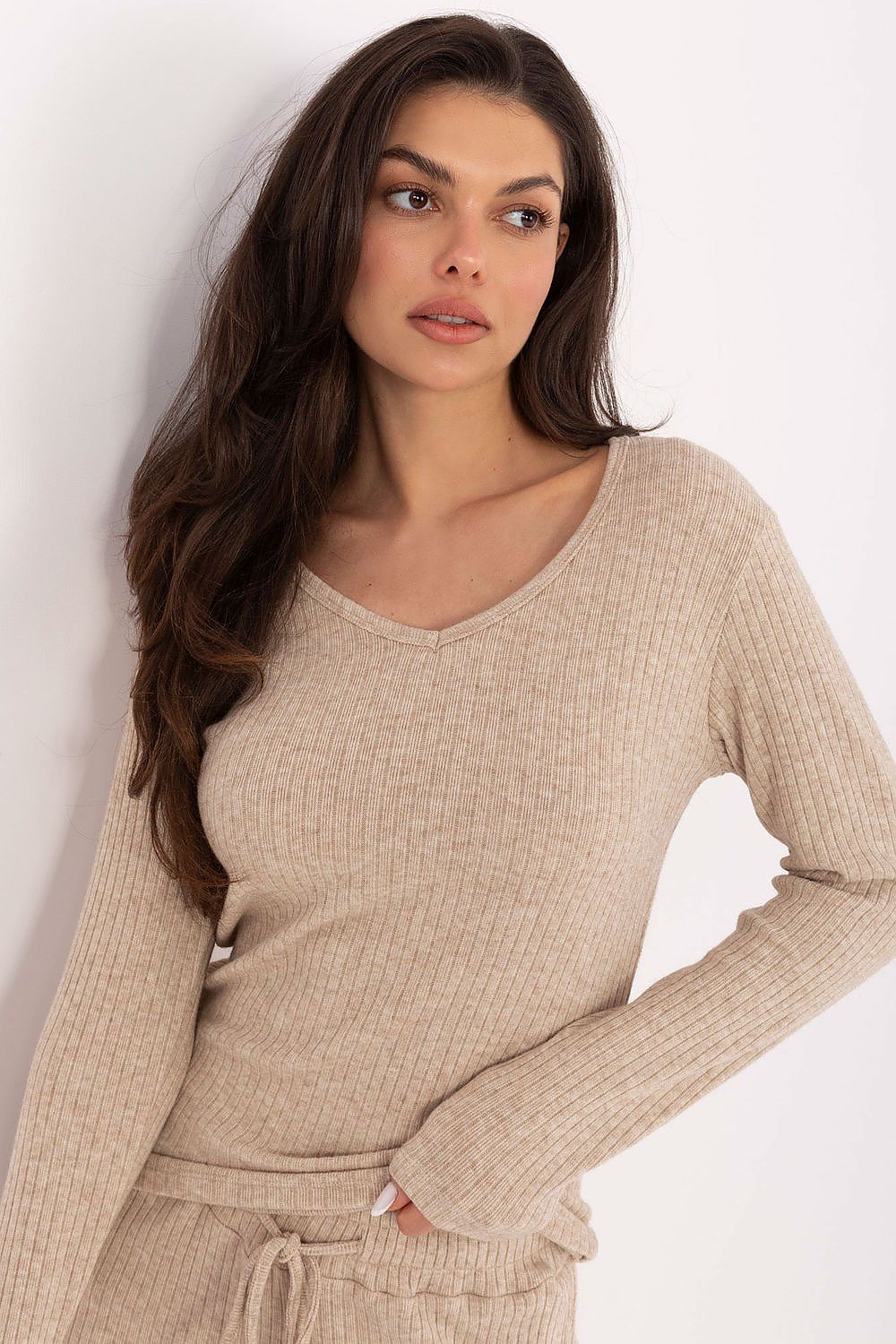 Elegant Women's Casual V-Neck Sweater by Factory Price in soft viscose blend, showcasing a chic minimalist design and ribbed finish.