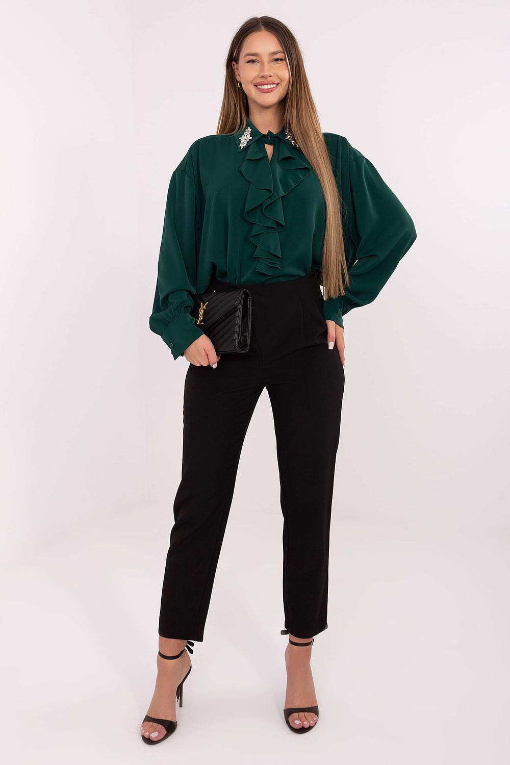 Side view of Factory Price elegant polyester blouse highlighting the innovative long-line design and stylish puff sleeves.
