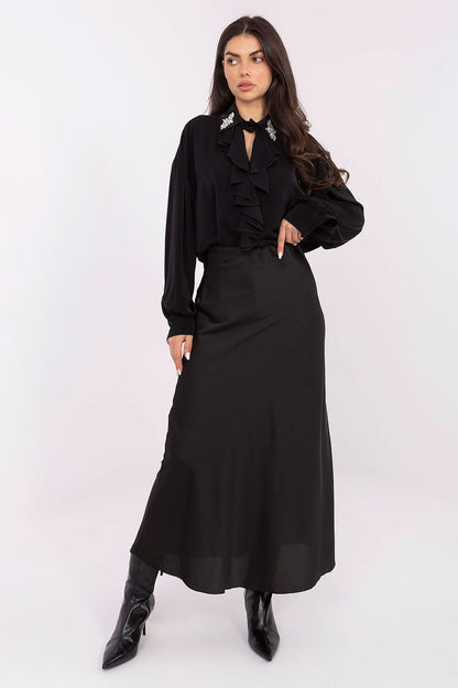 Stylish long-line polyester blouse by Factory Price, featuring a smooth texture and modern long-back design, ideal for year-round elegance.