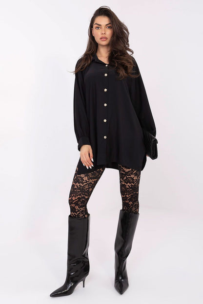 Detail of the delicate cuffs on an elegant women's shirt by Factory Price, designed with stylish puff sleeves for a modern yet refined look.