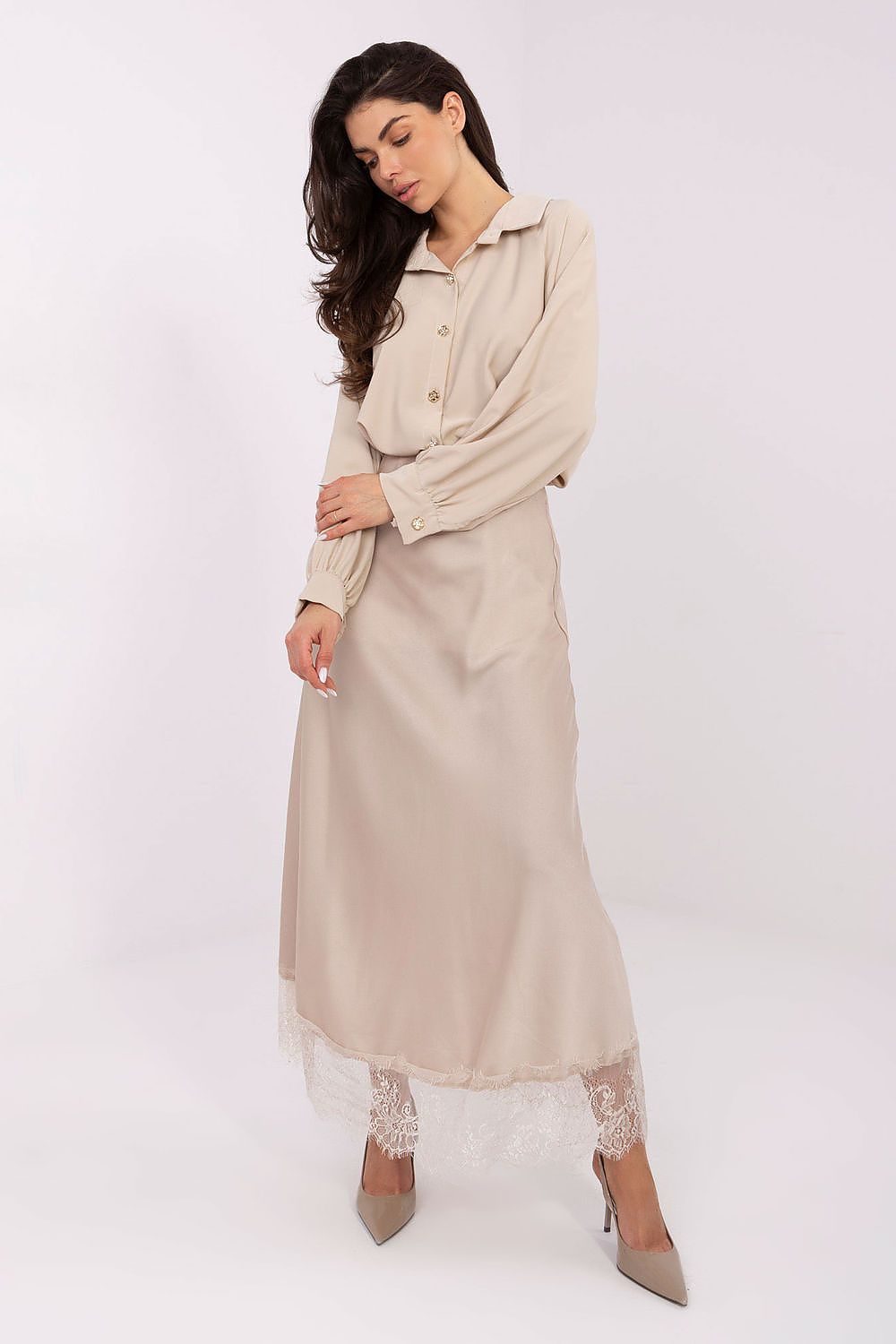 Stylish puff sleeves of the elegant women's shirt from Factory Price, designed to add a sophisticated touch to any outfit.