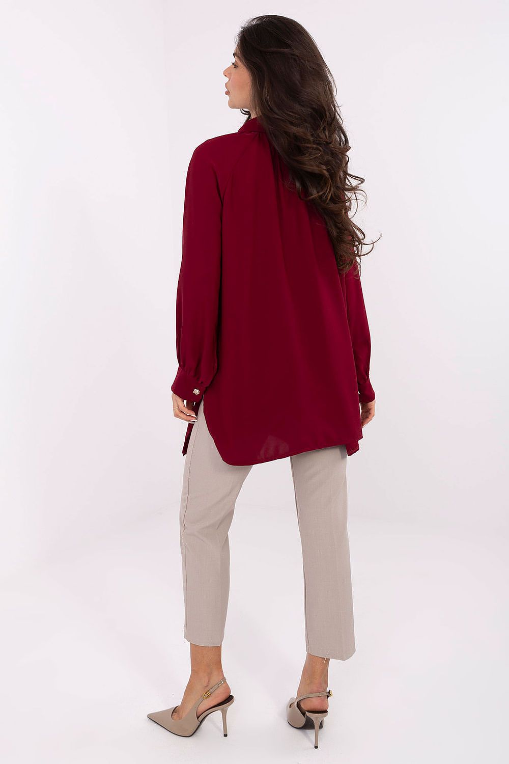 Elegant Long Sleeve Women's Shirt by Factory Price displayed on a mannequin, emphasizing its modern cut, puff sleeves, and stylish collar.
