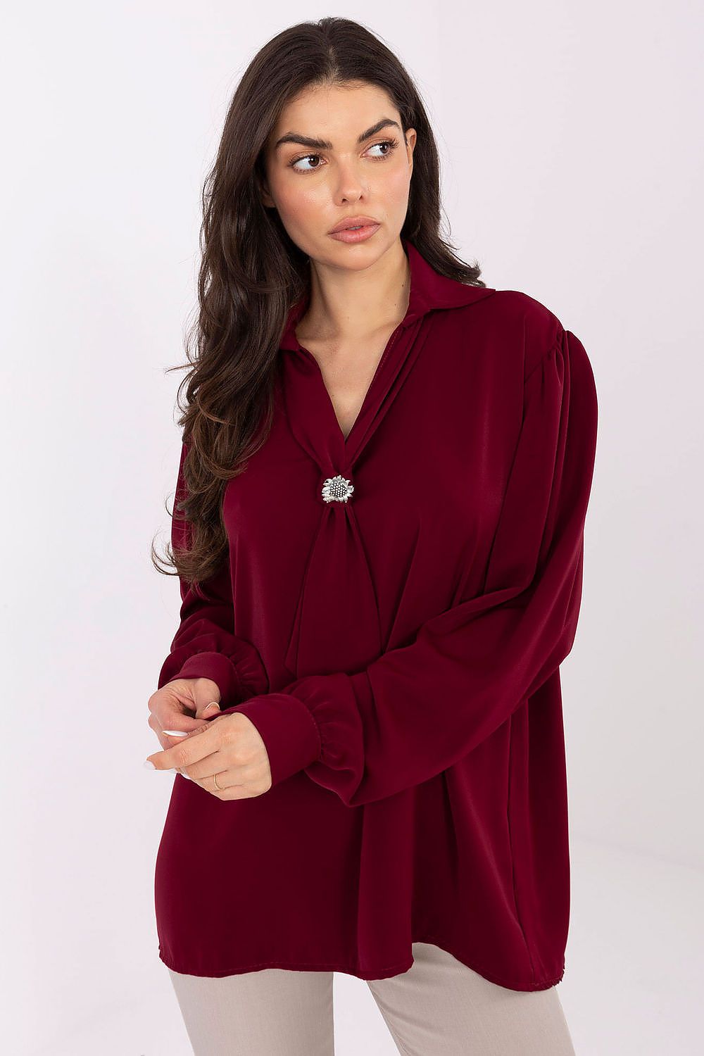 Model wearing the Elegant V-Neck Blouse with Puff Sleeves from Factory Price, demonstrating versatility for both casual and formal occasions.