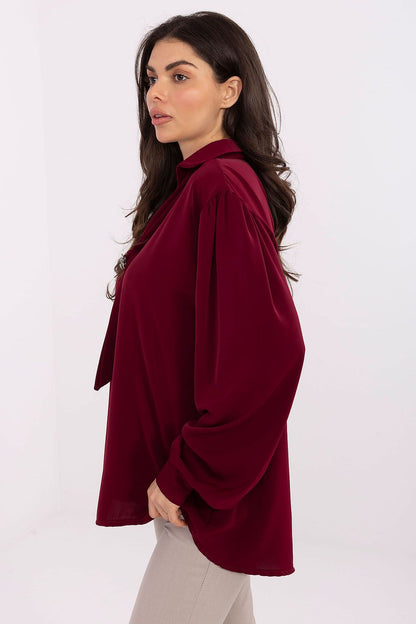 The Elegant V-Neck Blouse on a stylish hanger, emphasising its lightweight polyester material and sophisticated design from Factory Price.