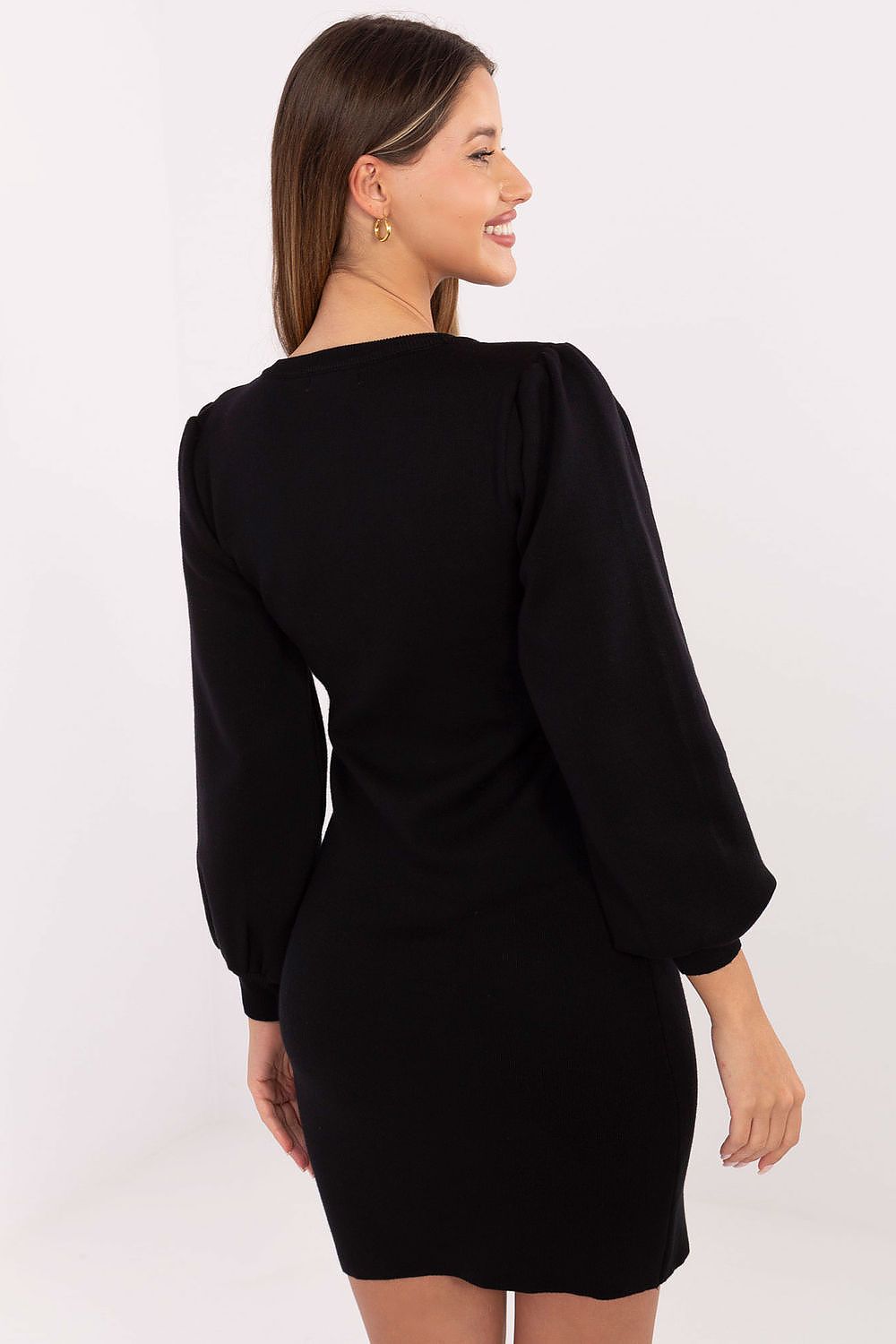 Elegant Knit Pencil Dress by Factory Price worn in a chic setting, perfect for transitioning from office to evening events, showcasing its flattering pencil silhouette.