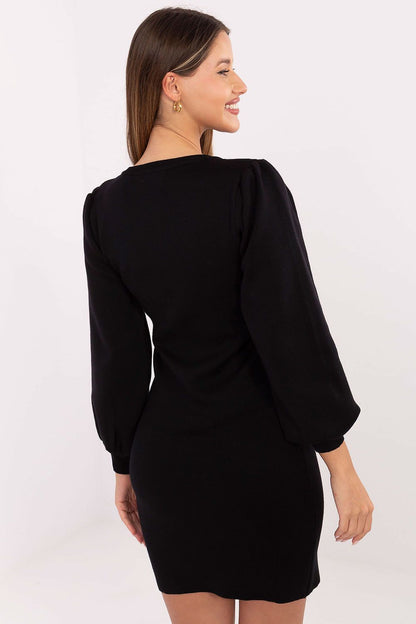 Elegant Knit Pencil Dress by Factory Price worn in a chic setting, perfect for transitioning from office to evening events, showcasing its flattering pencil silhouette.
