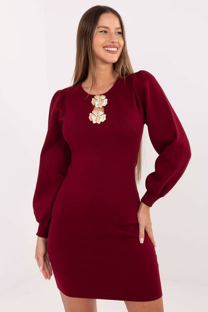 Model displaying the Elegant Knit Pencil Dress by Factory Price, demonstrating the comfortable fit and timeless design with soft fabric and long sleeves.