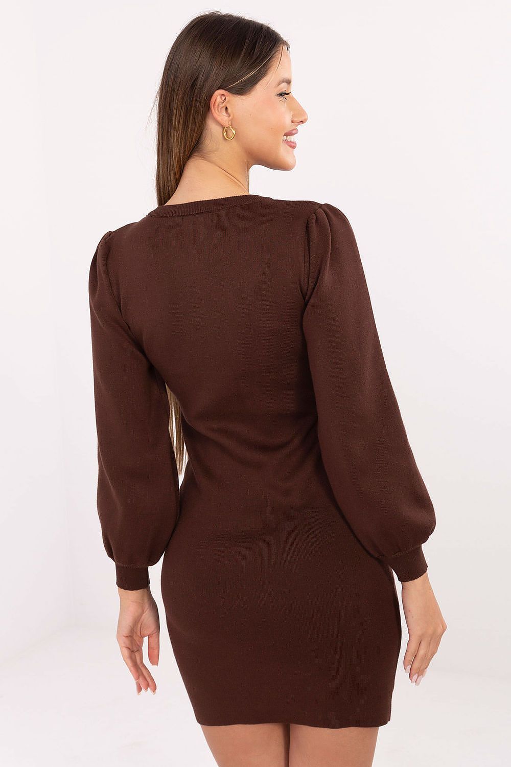 Versatile styling of the Elegant Knit Pencil Dress from Factory Price, with the detachable gold brooch showcasing its chic adaptability.