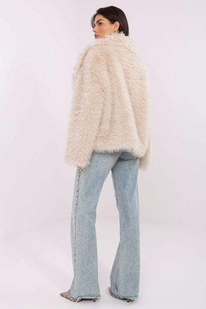 Close-up of the Elegant Women's Fur Jacket in EU Size 0 by Factory Price, highlighting its premium polyester fabric and elegant silhouette for versatile styling.