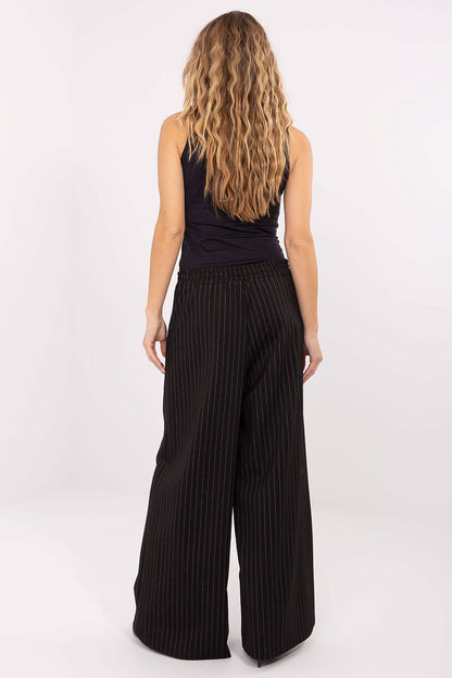 Close-up of Rue Paris Elegant Women's Palazzo Trousers displaying premium fabric blend and tailored decorative pleats for a refined look.