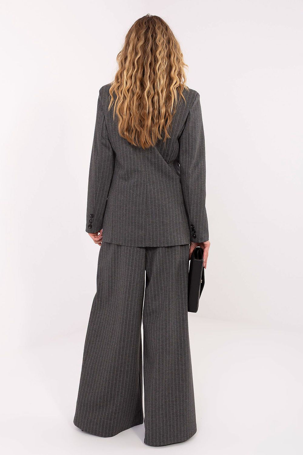 Close-up view of Rue Paris double-breasted blazer highlighting luxurious fabric and refined striped pattern.