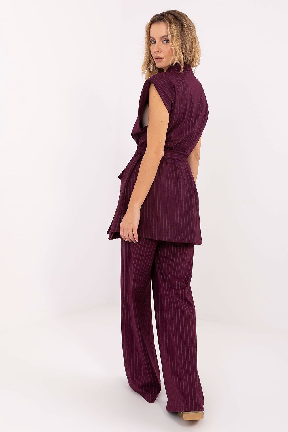 Elegant Striped Women's Gilet Vest with Tie Belt by Rue Paris styled with tailored trousers, ideal for formal occasions.