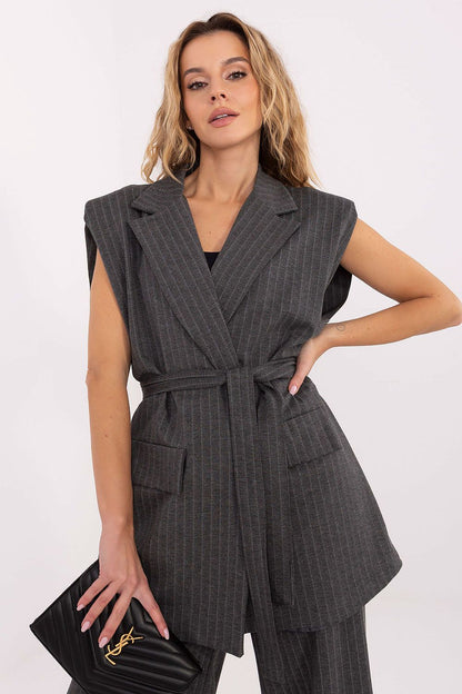 Fashionable presentation of the Elegant Striped Women's Gilet Vest with Tie Belt by Rue Paris, perfect for after-work events.