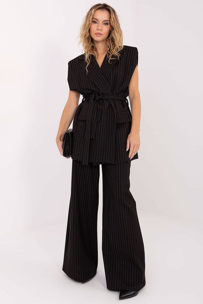 Elegant Striped Women's Gilet Vest on a model, highlighting the relaxed fit and luxury of Rue Paris workwear, ideal for elegant occasions.