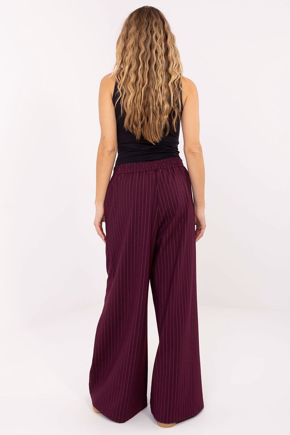 Close-up of Rue Paris Elegant Women's Palazzo Trousers showcasing the luxurious fabric blend and decorative pleats.