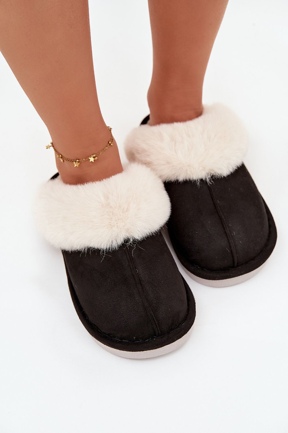 Variety of sizes EU 36-41 (US 6-10) of Step in Style's luxurious eco-suede women's slippers with fur lining, embodying elegance and comfort.