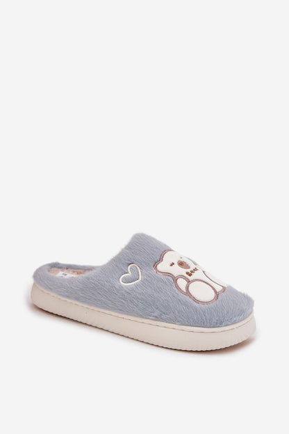 Step in style luxury fluffy slippers displayed with a cozy home setting, perfect for warm, stylish indoor relaxation.